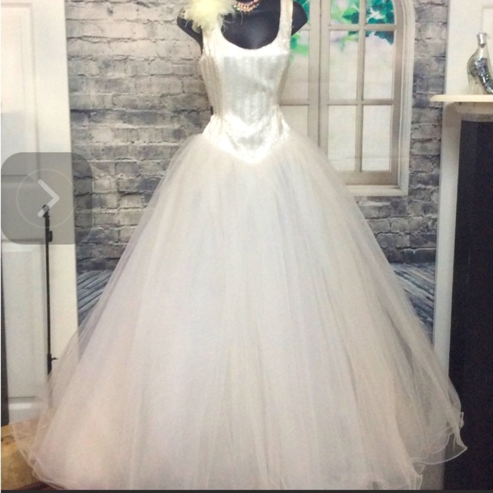 Beautiful ball gown by. A little bit of sparkle, a lot of glass beads.